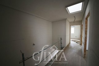 Casa adosada en venta en Tomelloso