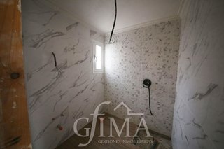 Casa adosada en venta en Tomelloso