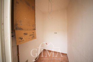 Casa adosada en venta en Tomelloso