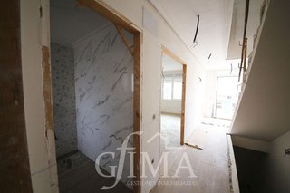 Casa adosada en venta en Tomelloso