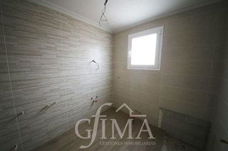 Casa adosada en venta en Tomelloso