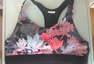 Top deportivo Domyos estampado floral Talla S -36