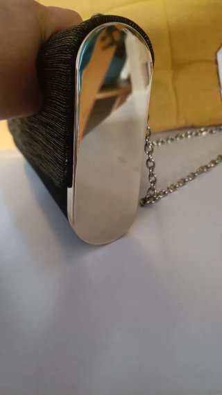 Bolso de fiesta negro y dorado
