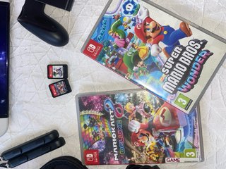 Nintendo Switch OLED Blanca Con 2 juegos