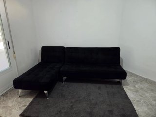 Sofá cama chaise longue reversible negro