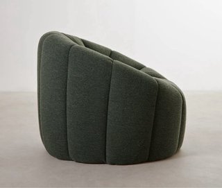 Sillón de diseño curvo verde