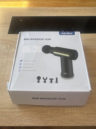 Pistola de masaje