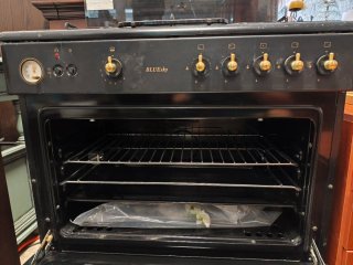 Cocina de gas con horno eléctrico