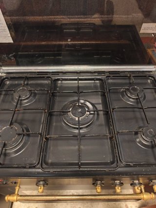 Cocina de gas con horno eléctrico