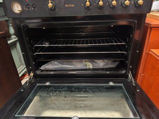 Cocina de gas con horno eléctrico