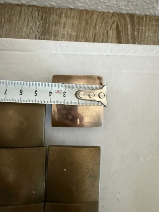 Tiradores de mueble metal dorados y plateados