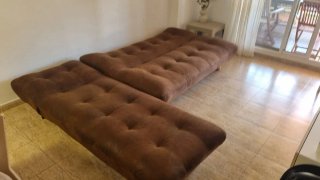 Sofá cama marrón con chaise longue
