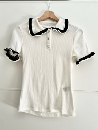 Top de punto blanco con cuello Peter Pan