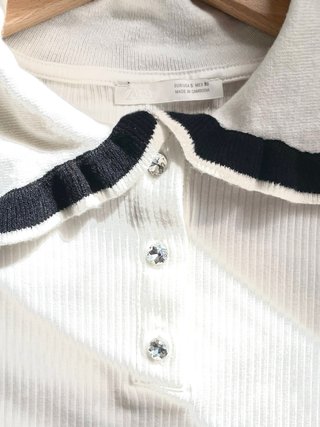 Top de punto blanco con cuello Peter Pan