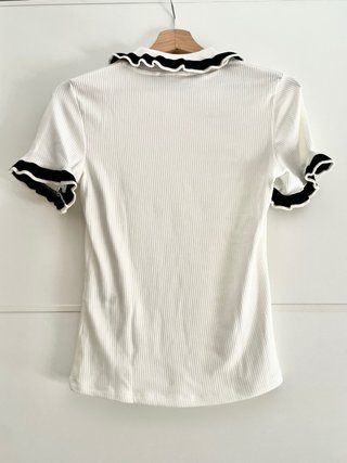 Top de punto blanco con cuello Peter Pan