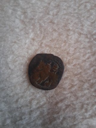 Moneda antigua de cobre