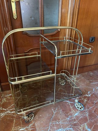 Mesa camarera dorada y cristal