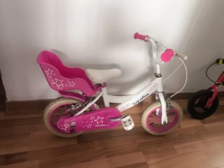 Bicicleta infantil Juguettos rosa y blanca