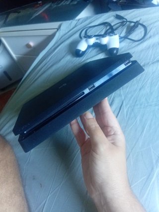 PlayStation 4 Slim 1TB + Mando DualShock 4