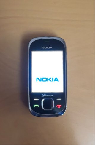 Nokia 7230 con cargador original