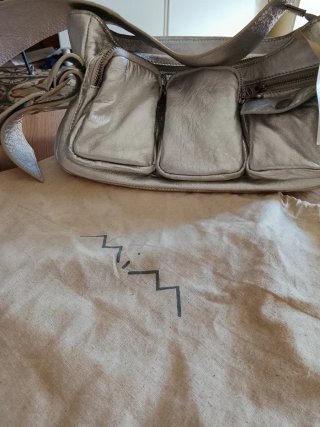 Bolso de piel MIM plateado