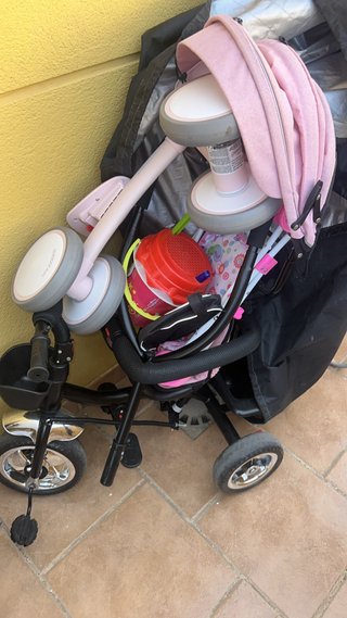 Lote de juguetes y triciclo para bebé