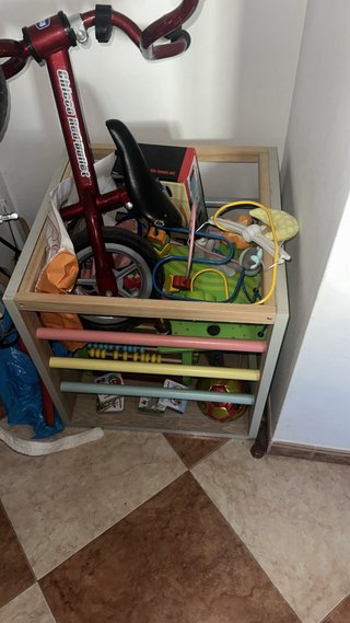 Lote de juguetes y triciclo para bebé
