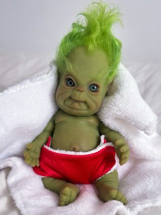 Muñeco Bebé Silicona Grinch