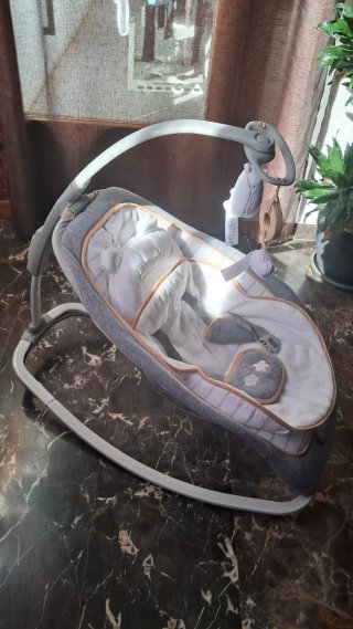Hamaca de bebé con arco de juegos
