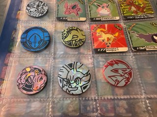 Álbum Pokémon + 26 Staks Panini + 7 Monedas TCG