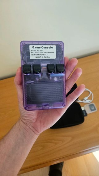 Consola R36S Morada NUEVA + microSD 64GB + Funda