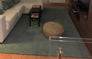 Alfombra gris/verde de tela