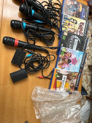 Pack Fiesta PS2: 5 Juegos y 4 Micrófonos