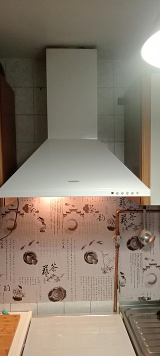 Cocina de Gas Indesit con Horno y campana extracto