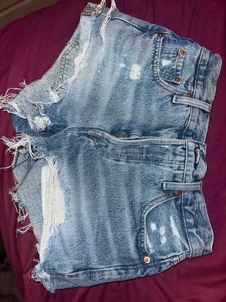 2 pantalones Shorts vaqueros levis y american eagl