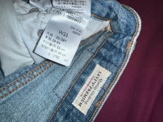 2 pantalones Shorts vaqueros levis y american eagl