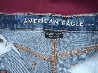 2 pantalones Shorts vaqueros levis y american eagl