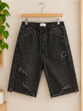 Pantalones cortos vaqueros negros rasgados