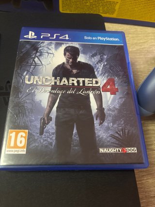 PS4 slim 1tb caja + mando + base carga y 2 juegos