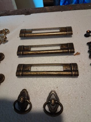 Set di 11 modelli di  maniglie e pomelli assortiti