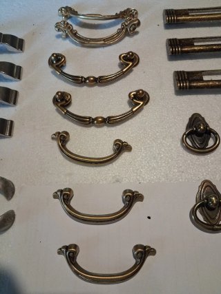 Set di 11 modelli di  maniglie e pomelli assortiti