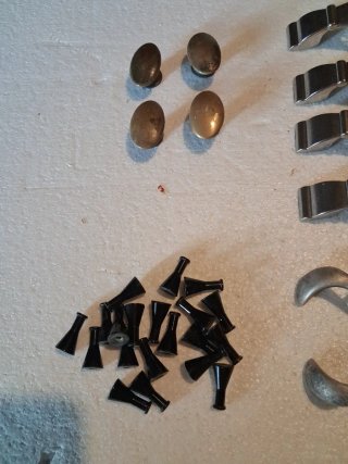 Set di 11 modelli di  maniglie e pomelli assortiti
