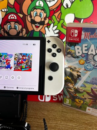 Nintendo Switch OLED Blanca + Juego Beasties