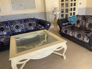 Juego de sillones de tela y madera