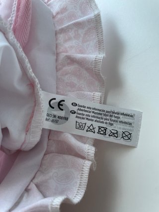 Mochila para llevar al bebe de juguete