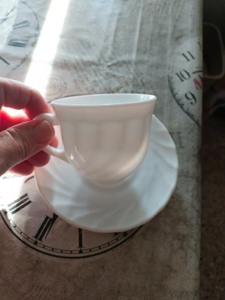 Taza de café de porcelana blanca