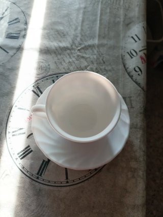 Taza de café de porcelana blanca