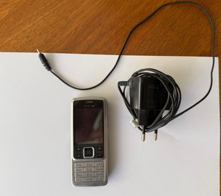 Nokia 6300 Plateado con su cargador original