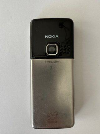 Nokia 6300 Plateado con su cargador original