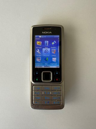 Nokia 6300 Plateado con su cargador original